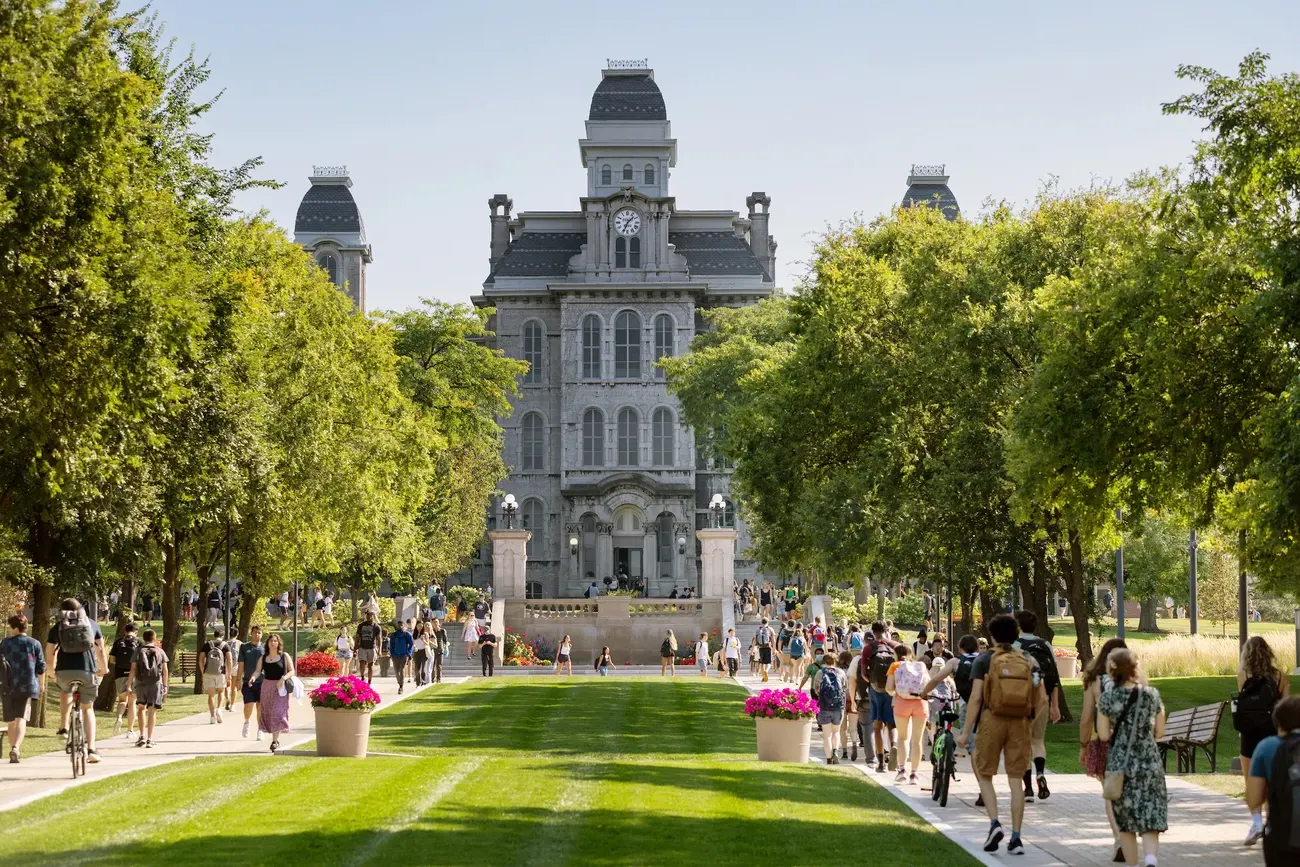 People walking on Syracuse's campus.